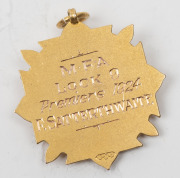 AUSTRALIAN RULES FOOTBALL AWARDS: Cobar District Football Association, prize fob in gold (9ct; 6.29g; 30x36mm), by W. Kerr, ring top suspension, obverse inscribed, 'Cobar Dist. Football Assn./Premiers/1918', reverse inscribed, 'Won by / Wrightville F.C. / - 5