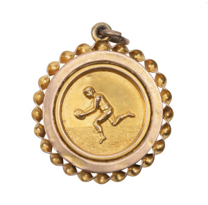 ELMORE FOOTBALL CLUB,&nbsp;prize fob in gold (9ct; 3.55g), by W. (Willis), ring top suspension, reverse inscribed, 'Holmes Trophy / Premiers 1910 / Elmore F.C. / S.L.Butcher'.&nbsp;Elmore is a small town north-east of Bendigo.