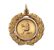 TWO NORTH HOBART FOOTBALL CLUB AWARDS TO RUPERT HIGGINS: an&nbsp;award fob in gold (9ct; 5.18g), by W (Willis), scroll and ring top suspension, reverse inscribed, 'Presented / By / Mr E.Preuss. / To/Rupert Higgins. / North Hobart /Club./ 1922'; and another awa - 2