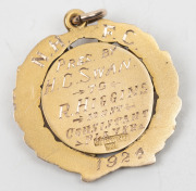 TWO NORTH HOBART FOOTBALL CLUB AWARDS TO RUPERT HIGGINS: an&nbsp;award fob in gold (9ct; 5.18g), by W (Willis), scroll and ring top suspension, reverse inscribed, 'Presented / By / Mr E.Preuss. / To/Rupert Higgins. / North Hobart /Club./ 1922'; and another awa - 3