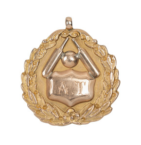 MOORE PARK CRICKET ASSOCIATION,&nbsp;prize fob in gold (9ct; 6.59g), by W.Kerr, obverse inscribed, 'A.T.', reverse inscribed, 'Moore Park C.A / 1914-15 / 'C' Gde. / won by / Newtown Mission C.C / A.Tanner, (Capt.)'.&nbsp;Very fine.