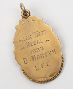 LAUNCESTON FOOTBALL CLUB, award fob in gold (10ct, 11.12g) by F & M, ring top suspension, obverse engraved "BEST & FAIREST" "SECOND LEAGUE", the reverse inscribed "ALAN WATT / MEDAL / 1933 / D. MARTYN / L.F.C." - 2