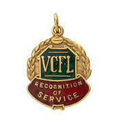 VICTORIAN COUNTRY FOOTBALL LEAGUE, award fob in gold (9ct; 8.41g) ring top suspension, by K.G. Luke; the obverse inscribed "VCFL / RECOGNITION OF SERVICE"; the reverse engraved "Presented to / MR. J. RITCHIE / by / HAMPDEN 2nd 18 F.L. * 1962 * "