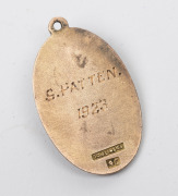 SOUTH AUSTRALIAN FOOTBALL LEAGUE life membership fob in gold (9ct; 6.45g) by Tomlinson; the obverse inscribed "PLAYERS LIFE MEMBERSHIP PASS" with "SAFL" at centre; the reverse engraved for S.PATTEN / 1923". - 2