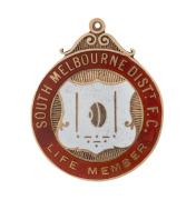 SOUTH MELBOURNE DISTRICT FOOTBALL CLUB, LIFE MEMBER'S fob in gold and enamel, (9ct; 4.36g) engraved on reverse "J. Hudson / Services Rendered"; circa 1955; very fine condition.