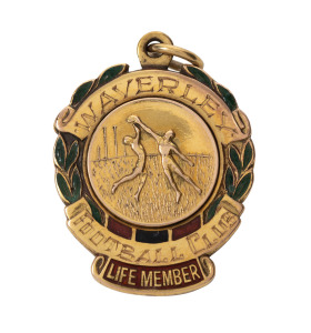WAVERLEY FOOTBALL CLUB LIFE MEMBER'S fob in gold (9ct; 12.07g) with ring top suspension, by K.G. Luke; engraved on reverse for "R.L. AJANI"; circa 1965. Excellent condition. Romeo Luciano (Lewis) Ajani (1906 - 1974). The Waverley club competed in the V.F.