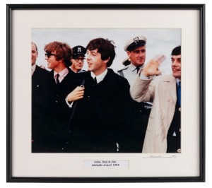 THE BEATLES IN AUSTRALIA, 1964: "John, Paul & Jim, Adelaide airport 1964". Original colour print, signed by Vic Grimmett in the lower margin, 24.5 x 29.5cm, 35 x 39cm overall.