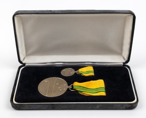 Barry Round's 2000 Australian Sports Medal with text 'TO COMMEMORATE AUSTRALIAN SPORTING ACHIEVEMENT', in original presentation case with accompanying medal miniature.