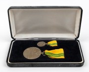 Barry Round's 2000 Australian Sports Medal with text 'TO COMMEMORATE AUSTRALIAN SPORTING ACHIEVEMENT', in original presentation case with accompanying medal miniature.