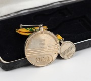 Barry Round's 2000 Australian Sports Medal with text 'TO COMMEMORATE AUSTRALIAN SPORTING ACHIEVEMENT', in original presentation case with accompanying medal miniature. - 2