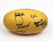 A souvenir rubber "SKILBALL" football signed at a charity event, circa 1985 by Terry Daniher, Ricky Kennedy, Kevin Sheedy, Kevin Bartlett, Lorenzo 'Laurie' Serafini and several others. - 2