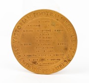 1965 ESSENDON PREMIERSHIP MEDAL, (by K.G. Luke, Melbourne) with the front depicting a footballer by Andor Meszaros (1900-72, who had also designed 1956 Melbourne Olympics medals); the reverse showing the players names in their positions on the field, surr - 2