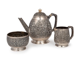 GRISH CHANDER DUTT fine quality antique Indian silver three piece tea service with impressive repousse decoration and ivory finial, 19th/20th century, stamped "GRISH CHANDER, BHOWANIPORE, CALCUTTA", the teapot 14cm high, 660 grams total.