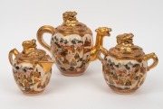 SATSUMA antique Japanese earthenware three piece tea set with dragon spouts and finials, Meiji Period, 19th/20th century, black and gilt seal mark to base, ​​​​​​​the tea pot 18cm high, 20cm wide. - 2