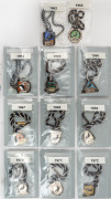 COLLINGWOOD FOOTBALL CLUB: 1962 - 1972 Membership fobs, all with original black & white lanyards. (Total: 11 items).