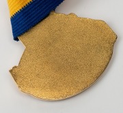 WILLIAMSTOWN F.C. TEAM OF THE CENTURY: Barry Round's 2003 Team of the Century medal. - 2