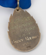 J.J. LISTON TROPHY: Barry Round's 1987 medal with text 'Best & Fairest Award - Victorian Football Association' and engraving on reverse 'J.J. Liston Best & Fairest 1st Division Won By Barry Round 1987'. Round is one of only three players ever to have won - 2