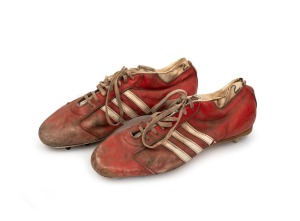 Pair of Barry Round's match-worn red-and-white Adidas footy boots with number 25 inscription on both heels in permanent marker, c. 1980.