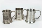 Three of Barry Round's pewter tankards - one commemorating Round's inclusion in the 1982 Sun All Stars Team, one with inscription 'Barry - Happy 50th - You Legend - Gary', and one with inscription 'AFL LIFE MEMBERS 1994 - Golf Champion - John "Sam" Newman
