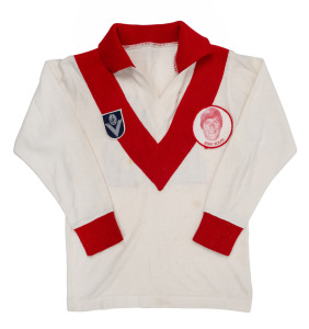 Late 1970s children's long-sleeved South Melbourne Swans VFL guernsey, VFL logo and Barry Round photo patch on front, number 25 on back, owned by Barry Round.