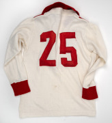 Late 1970s children's long-sleeved South Melbourne Swans VFL guernsey, VFL logo and Barry Round photo patch on front, number 25 on back, owned by Barry Round. - 2