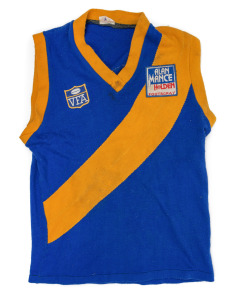 Barry Round's 1986 Williamstown F.C. guernsey, match-worn during his VFA Grand Final victory that year, VFA logo and Alan Mance Holden Footscray branding on front, number 25 on back. Round became premiership Captain-Coach in September of that year.