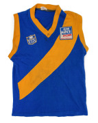Barry Round's 1986 Williamstown F.C. guernsey, match-worn during his VFA Grand Final victory that year, VFA logo and Alan Mance Holden Footscray branding on front, number 25 on back. Round became premiership Captain-Coach in September of that year.