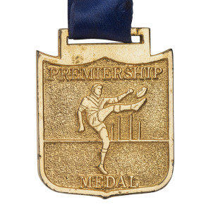 1990 VFA PREMIERSHIP WIN: Barry Round's Premiership Medal with text 'Grand Final VFA 1990' on reverse.