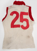 Barry Round's match-worn c. 1976 South Melbourne Swans VFL guernsey, number 25 on back. Released by Footscray to South Melbourne in 1976, the stage was now set for Round to make his mark, quickly garnering acclaim as the new Swans ruckman, before going on - 2