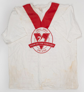 Barry Round's 2003 Swans Team of the Century commemorative T-shirt, together with his 2005 Swans Premiers polo and his c. 2000s Geelong F.C. Adidas supporter guernsey.