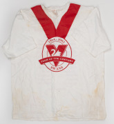 Barry Round's 2003 Swans Team of the Century commemorative T-shirt, together with his 2005 Swans Premiers polo and his c. 2000s Geelong F.C. Adidas supporter guernsey.