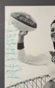 1984 black and white photograph of Barry Round with female Swans enthusiast and Harbour Bridge in background, featuring more than forty original signatures of Swans players including Pat Foy, Barry Mitchell, Craig Potter, Warwick Capper, Wayne Carroll, St - 2