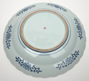 A Japanese Arita ware porcelain charger with koi carp and bamboo decoration, Meiji period, 19th/20th century, hand-painted seal mark to base, 42cm wide - 2