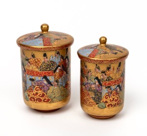 KUTANI WARE two lidded Japanese porcelain beakers with gilt decorated grounds, 20th century, ​​​​​​​seal marks to base, 12cm and 11cm high