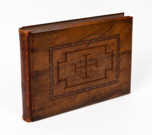 "FLOWERS OF THE HOLY LAND" by The White Store, Shammas Brothers, Jerusalem. An attractive album with carved olive wood boards and Morocco spine, 25 x 33cm overall
