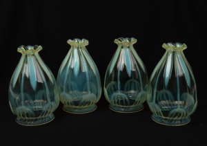 A set of four antique vaseline glass light shades, late 19th century, 17cm high