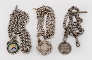 Three antique sterling silver fob chains with fobs, 19th/20th century, the largest 41cm long, 195 grams total.