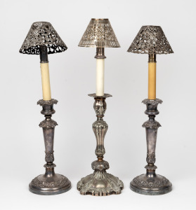 Three assorted antique silver plated candlestands with pierced shades, 19th/20th century, the largest 52cm high.
