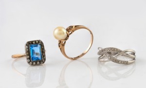 A 9ct white gold and diamond ring, a 10ct gold, pearl and diamond ring, and a 9ct gold ring with blue and white stones, (3 items), 8 grams total