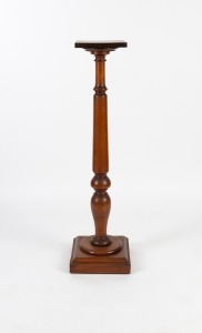 An antique English mahogany pedestal with turned and baluster column on plinth base, circa 1900, 123cm high, the top 26cm wide, 25cm deep