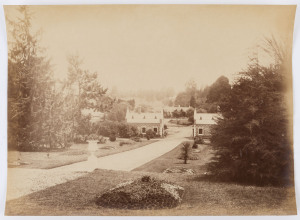 INDIAN PHOTOGRAPHS: Two albumen prints, circa 1870, probably by A.T.W. Penn, comprising "No.4: Ootacamund from Church Hill showing the church, Public offices, Library." and "17. Ootacamund. Entrance to the Botanical Gardens, from within". (both labelled in pencil, verso). Each 21 x 28cm. (2 items).