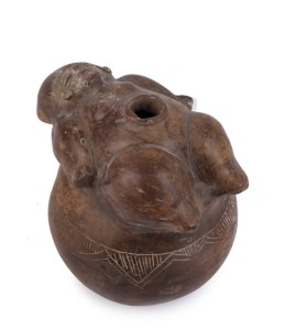 A pre-Columbian figural pottery vessel with incised decoration, Central America, 16cm high