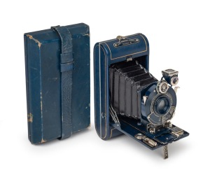 KODAK: Vest Pocket Kodak Series III Vanity 127 film camera, in blue with original bellows, Kodak Anastigmat 83mm f6.3 lens [#55509] and matching satin-lined case, c. 1930.