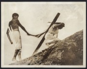 CRIME AND PUNISHMENT: Twenty-one 1930s press photographs, the largest 20.5 x 25cm, depicting various United States crime scenes and dramas, together with images from various other countries including a striking image taken in Lhasa, Tibet of a condemned m - 2
