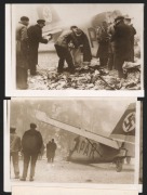 AIRMAIL INTEREST: Two Associated Press photographs of the 1938 crash of a German Junkers 52 mail plane near Paris, the first image clearly showing efforts to recover airmail from the burnt-out wreckage, with official stamps on rear and accompanying news c