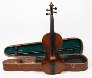 An antique German trade violin with bow in mahogany veneered case, the violin with internal label "Copy of Nicolaus Amatus Fecit Made in Germany'", the violin 60cm long, the case 80cm long.