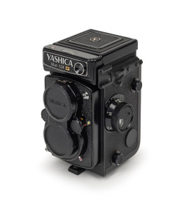 YASHICA: Yashica Mat-124 G TLR camera [#1040105] with Yashinon&nbsp;80mm f3.5 lens [#719046],&nbsp;Copal-SV shutter, and Yashica twin lens cap, c. 1971.