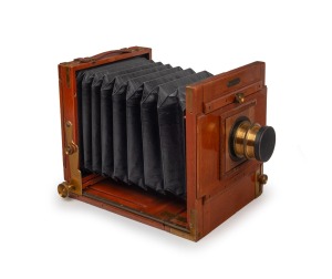 5 x 7" plate tailboard camera with Rodenstock Eurynar Doppel-Anastigmat 240mm f6.8 lens [#35825], lens cap, focusing hood, three plate holders, and 'Ottomar Ansch&uuml;tz Berlin' retailer's plate, c. 1890s.