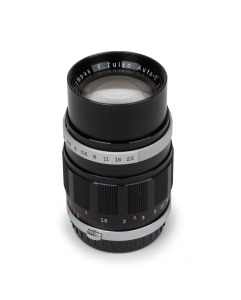 OLYMPUS: F. Zuiko Auto-T 70mm f2 lens [#102228] with Olympus rear lens cap.