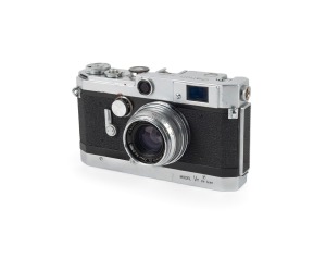 CANON: Canon VT de luxe rangefinder camera [#543260] with Canon 35mm f2.8 lens [#21347] and Canon leather case, c. 1957.